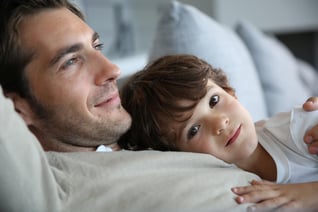 Boy with daddy relaxing on his chest-1_11zon